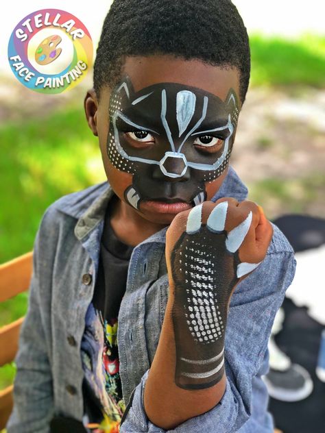 Black Panther Face Paint and arm paint Panther Face Paint, Face Paint Black Panther, Marvel Face Paint, Black Panther Face Paint, Superhero Face Paint, Boys Face Painting Ideas, Black Panther Inspired Makeup, Hero Face Paint, Black Panther Makeup