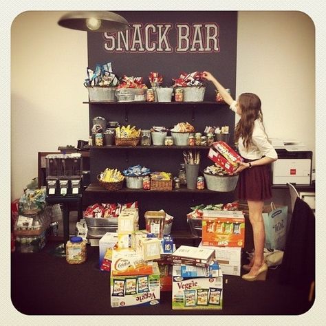 Not worth going to website, just love this idea for a "snack bar" would like to incorporate idea into pantry Movie Room Snack Bar, Snack Bar Ideas, Youth Group Rooms, Staff Lounge, Snack Display, Snack Station, Office Snacks, Startup Office, Lots Of Food