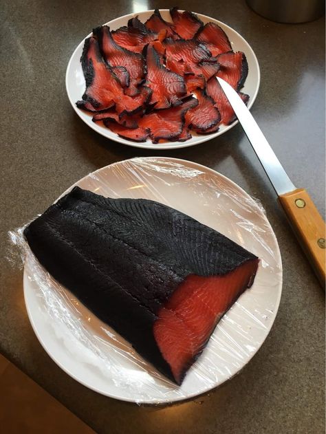 BLUEBERRY CURED SALMON 

Blueberry Copper (Russian) River Red Salmon
(This recipe is kindly shared by Diane Wiese of Cordova, with a few modifications by Nick VanderHoff of Cooper Landing). For the full article "This blueberry-cured red salmon captures the best of Alaska's wild bounty", go to ADN.COM Aug 5, 2016

This fish is as fun to look at as it is to eat! Our first run sockeye fillet from the Russian River falls is brilliant red with a dark blueberry exterior. The berry flavor hits you firs Cured Salmon, Preserving Recipes, Red Salmon, Russian River, River Falls, Meal Ideas, Log, Fish, Fruit