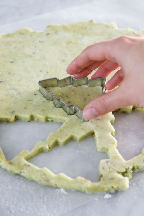 Dec 22, 2020 - Holiday baking season is upon us, and these pistachio-flavored cutout cookies are the perfect canvas for holiday decoration. These incredibly soft, subtly green sugar cookies are flecked with bits of chopped pistachios and decorated with Butter Pecan Roll Out Cookies, Hot Chocolate Roll Out Cookies, Pistachio Cut Out Cookies, Rolled Out Cookies, Christmas Roll Out Cookies, Flavored Roll Out Cookies, Pistachio Sugar Cookies, Flavored Sugar Cookies Cut Outs, Sugar Cookie Flavor Ideas