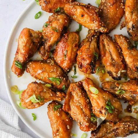 Korean Bulgogi Chicken Wings. Crispy wings coated in a sweet sesame glaze. My air fried wings are delicious, crunchy, and full of flavour thanks to the glaze. These bulgogi wings are great as an appetizer, snack or main. I also share instructions on how to cook these without an air fryer if you do not own one. They will be the best bulgogi wings you've ever tried! Ready in under 30 minutes Bulgogi Chicken, Korean Potato Salad, Chicken Wings Crispy, Cooked Chicken Temperature, Wings Crispy, Asian Chicken Wings, Korean Chicken Wings, Bbq Chicken Wings Recipe, Korean Bulgogi