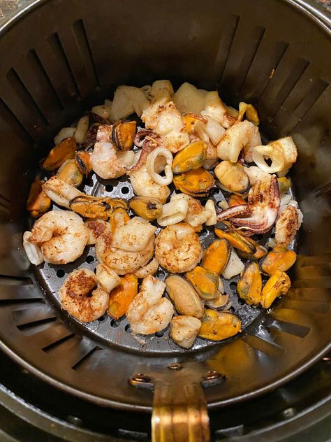 This air fryer seafood medley is amazing! Just put a bag of frozen seafood mix in the air fryer and it will cook it to perfection! Air fried seafood medley is so easy to make and so yummy, you'll love it! Frozen Seafood Mix Recipes, Air Fryer Seafood, Seafood Medley Recipes, How To Cook Garlic, Mixed Seafood Recipe, Fried Seafood, Seafood Medley, Octopus Recipes, Seafood Mix