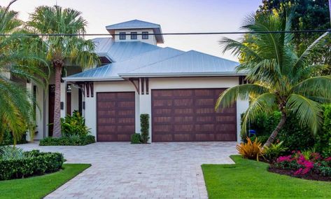 metal-roof-house-front-project-gulf-coast-roofing-naples-florida Metal Roof Coastal House, Florida Home Exterior Colors Stucco, Hip Roof Beach House, 30a Florida Homes, Florida Homes Exterior, Seaside Florida Architecture, Metal Roof Colors, Metal Roof Houses, Coastal Exterior