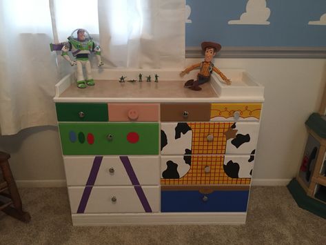 Toy story dresser in Colten’s room.  Drawers for Buzz, Woody, Jesse, Hamm, Rex, and Slinky Toy Story Room Decor, Toy Story Bedroom, Toy Story Nursery, Toy Story Room, Toy Story Baby, Toddler Boy Room Decor, Toy Story Theme, Disney Rooms, Toddler Boys Room