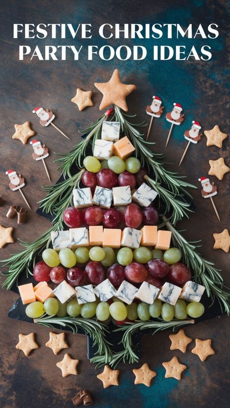 This image displays festive Christmas party food ideas, featuring a cheese and fruit board styled as a Christmas tree. It includes cubes of cheese, grapes, rosemary sprigs, and star-shaped crackers, surrounded by Santa-themed toothpicks. Perfect for a Christmas buffet or holiday brunch with a crowd! Christmas Buffet Ideas, Easy Christmas Party Food, Festive Buffet, Christmas Party Buffet, Food Ideas For A Crowd, Christmas Eve Appetizers, Ultimate Christmas Party, Evening Food, Christmas Party Food Ideas