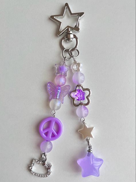 #aesthetic #beadedjewelryofinstagram #beadedkeychain #coquette #acubi #hellokitty #pastel #keychain Beads Keychain Aesthetic, Morado Aesthetic, Pastel Keychain, Handmade Purple Fairycore Jewelry, Pastel Hello Kitty, Purple Bead Keychain, Purple Keychain Aesthetic, Purple Keychain, Charm Ideas