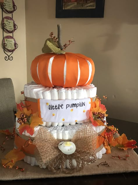 Diaper Cake Pumpkin Theme, Fall Baby Shower Diaper Cakes, Diaper Cake Fall Theme, Cake Pumpkin Theme, Pumpkin Diaper Cake Girl, Little Pumpkin Diaper Cake, Pumpkin Themed Baby Shower Ideas, Little Pumpkin Baby Shower Cake, Halloween Diaper Cake