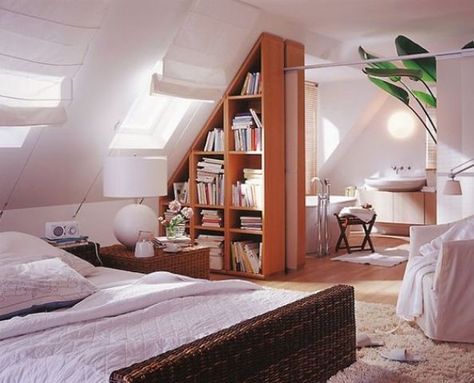 divide the spaces with a large triangle shaped bookshelf that perfectly fits the attic roof Slanted Ceiling Bedroom, Attic Master Suite, Sloped Ceiling Bedroom, Small Attic Bedroom, Loft Bedrooms, Attic Bedroom Designs, Attic Loft, Attic Design, Attic Apartment