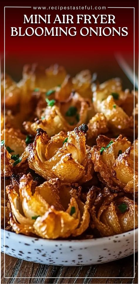 Mini Air Fryer Blooming Onions are a healthier and easier way to enjoy the crispy, flavorful appetizer everyone loves! Made with small onions, flour, seasonings, and breadcrumbs, these mini versions are air-fried to perfection for a golden, crispy texture without the excess oil. Serve them with your favorite dipping sauce for a delicious snack or appetizer that everyone will enjoy! Mini Blooming Onion Air Fryer, Blooming Onion Recipe, Mini Air Fryer, Blooming Onions, Onion Appetizers, Blooming Onion Recipes, Blooming Onion, Crispy Onions, Onion Recipes