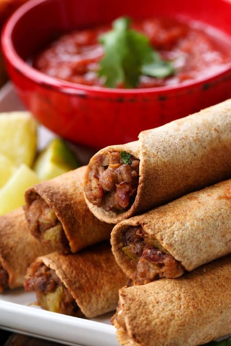 Addicting Beef Taquitos can be made in an air fryer, the oven or pan fried. Crispy tortilla shells stuffed with a cheesy, beef filling! Taquitos Appetizers, Taquitos Air Fryer, Homemade Taquitos, Healthy Cravings, Beef Taquitos, Baked Taquitos, Shells Stuffed, Taquitos Beef, Taquitos Recipe