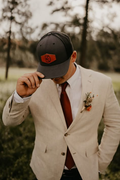 Groom With Hat On, Groom Wearing Hat, Groom Suit With Hat, Groom With Baseball Hat, Groom Ball Cap Wedding, Wedding Hats For Men Groom Attire, Groom Wearing Baseball Hat For Wedding, Groomsmen With Ball Caps, Groomsmen Ball Caps