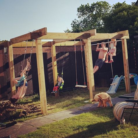 Our garden pergola / climbing frame with swings, monkey bars, trapeze bars and a pull up bar. Just need to grow some stuff up it now! Patio Chico, Pergola Diy, Garden Pergola, Pergola Swing, Lighting Tips, Pergola Lighting, Wooden Pergola, Covered Pergola, Monkey Bars