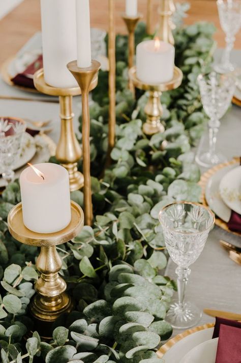 eucalyptus table runner - photo by Kai Heeringa Photography http://ruffledblog.com/modern-romantic-wedding-ideas-with-marsala Eucalyptus Wedding Decor, Gold Winter Wedding, Greenery Wedding Centerpieces, Rustic Wedding Decorations, Winter Wedding Inspiration, Eucalyptus Wedding, Gold Candles, Wedding Table Decorations, Deco Floral