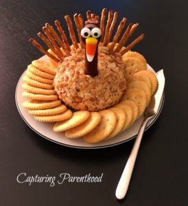 Thanksgiving Turkey Cheeseball, Cheese Ball Turkey Shape, Turkey Cheeseball With Pretzels, Turkey Cream Cheese Ball, Turkey Hors D’oeuvres, Thanksgiving Cheeseball Turkey, Turkey Dessert Board, Turkey Tail Cheese Board, Cute Thanksgiving Decor