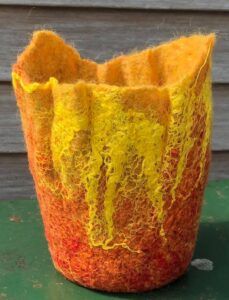 Today I’ve come across this awesome beginner tutorial from the, always wonderful, Living Felt!  In this free tutorial Marie shows you how to create this awesome bowl by felting over a resist.  I love the striking colours on the outside, … Read More... Felted Knitting, Living Felt, Wet Felting Tutorial, Felted Basket, Felt Basket, Felted Bowls, Yarn Basket, Felt Yarn, Felt Flowers Diy