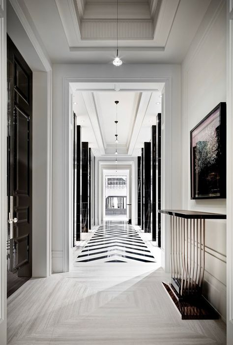 This black-and-white hallway isn't the only mesmerizing thing about this $50 million Ferris Rafauli–designed home in Toronto, an unabashed ode to luxury | archdigest.com Black And White Hallway, Ferris Rafauli, Decoration Hall, White Hallway, Corridor Design, Black And White Interior, Gorgeous Interiors, Lobby Design, Interior Modern