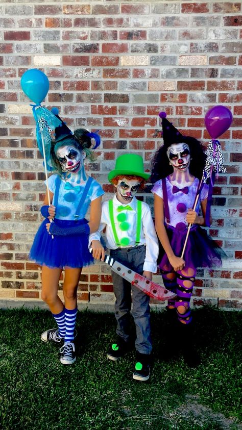 Creepy clown kids  Siblings Clown Face paint Creepy kids  Parenting win Halloween Kids Creepy Clown Costume, Scary Clown Kids Costume, Kids Creepy Clown Makeup, Kids Clown Face Paint, Diy Killer Clown Costume, Diy Creepy Clown Costume, Family Clown Costumes, Boy Clown Costume, Boys Scary Halloween Costumes