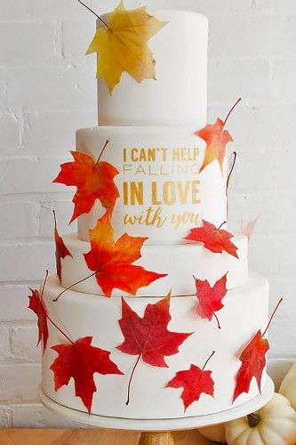 white wedding cake with maple leaf accents Maple Leaf Cake, Maple Leaf Wedding, Leaf Wedding Cake, Autumn Wedding Cakes, Fruit Wedding Cake, Leaf Cake, Wedding Cake Fresh Flowers, Cake Rack, Thanksgiving Cakes