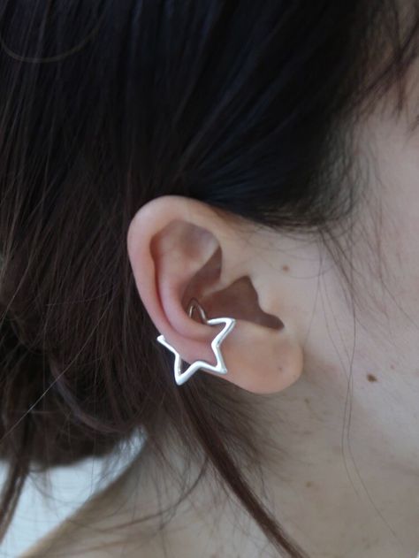 Different Earrings In Each Ear, Several Ear Piercings, Cuff Piercing Ear, Cute Piercings Ears Simple, Star Conch Piercing, Two Pierced Ears Earrings, Star Piercing Ear, Star Ear Cuff, Ear Piercings Star