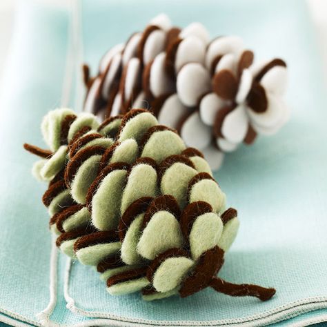 These felt pinecone ornaments are an inexpensive project that can be used for years. Find out how to make them: http://www.bhg.com/christmas/crafts/make-christmas-ornaments-with-felt/?socsrc=bhgpin093012feltpinecones#page=12 Felt Ornaments Diy, Diy Felt Christmas Tree, Pine Cone Christmas Tree, Ornaments Tree, Pinecone Ornaments, Felt Christmas Tree, Navidad Diy, Tree Pattern, Felt Christmas Ornaments