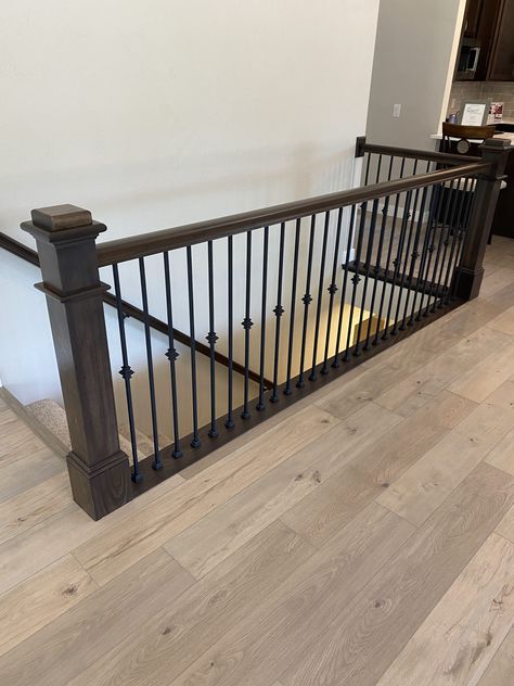 Indoor Iron Railing, Step Rails Indoor, Dark Railing Light Floor, Railing Inside The House, Oil Rubbed Bronze Stair Railing, Railing Around Stairs To Basement, Wrought Iron Stair Railing Makeover, Painting Handrails For Stairs, Light Wood Floors Dark Stair Railing