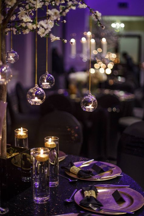 May 1st Black and Gold, Gatsby event, styled by Luxury Events Group. The Venue, Grand Station, was stunning and our styling added a touch of glamour to this traditional and sought after building based in the heart of Wolverhampton. For more information go to: www.luxuryeventsgroup.co.uk  All photography is courtesy of Stephen McGowan Photography http://www.mcgowanweddings.co.uk/ #blackandgold #gatsby #venue #venueinspo #weddinginspo #party #styling Purple And Gold Event Decor, Purple Black And Gold Masquerade Party, Purple Gold Black Party, Black White Gold Purple Wedding, Masquerade Themed Wedding, Black Gold Purple Party Decor, Purple Gold And Black Party Decorations, Black And Purple Quinceanera Theme, Black Purple And Gold Wedding