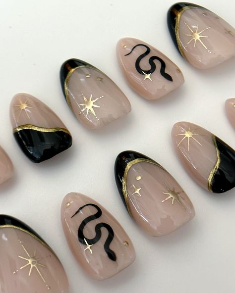 Spooky season may be over, but celestial snakes are always the vibe 🐍✨ IB: @ersanails #pressonnails #custompressonnails #nailart #nailtrends #gelnails Press On Nail Aesthetic, Year Of Snake Nails, Dark Celestial Nails, Tangled Nail Designs, Chinese New Year Nails Snake, Lunar New Year Nails Snake, Nail Snake Design, Gold Snake Nails, Snake Nails Acrylic