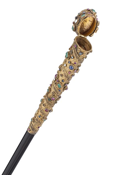 A pill box is conveniently integrated into the exquisite handle of this system cane. The handle is plated in 14K yellow gold and is bejeweled with an assortment of rubies, emeralds and lush white pearls. ~ 19th Century Decorative Cane ~ For Sale by M.S. Rau Antiques Canes Decor, Wooden Walking Canes, Cane Stick, Canes And Walking Sticks, Cane Handles, Walking Tall, Wooden Walking Sticks, A Pill, Walking Sticks And Canes