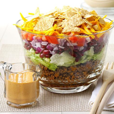 Taco Salad for a Large Crowd Recipe: How to Make It Taco Salad Layered, Layered Taco Salad, Nacho Salat, Layered Taco, Gelatin Salad, Potluck Salad, Taco Salad Recipe, Warm Potato Salads, Layered Salad Recipes