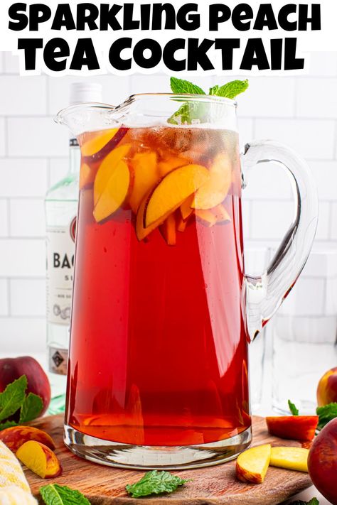 Head on photo of sparkling peach cocktail in a large glass pitcher with peach slices and mint sprigs. Peach Tea Cocktail, Refreshing Summer Recipes, Fun Party Drinks, No Bake Cherry Cheesecake, Kid Friendly Drinks, Tea Cocktail, Tea Cocktails, Easy Drink Recipes, Baked Fries