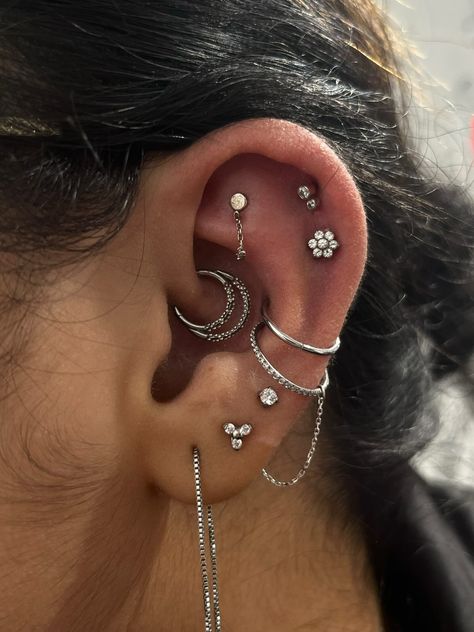 FINALLY, THE EAR CURATION INSPO YOU'VE BEEN WAITING FOR! ✨  DONE BY @lobopiercings  Soho, Union Square, and Williamsburg  11AM-9PM 7 DAYS A/W🕘 WALK-INZ OR BOOK ONLINE..📕 TATTOOS & PIERCINGS, NO ATTITUDE, NO MISERABLE HOOPS TO JUMP THROUGH....🚫  WALK-INZ WELCOME OR BOOK ONLINE AT  ⚔️livebytheswordtattoo.com⚔️ . . . . #earcuration #flatpiercing #bodypiercing #piercing #unionsquare Silver Ear Curation, Full Ear Piercings Silver, Silver Curated Ear Piercing, Ear Scape Ideas Silver, Whole Ear Pierced Aesthetic, Ear Curation Silver, Alt Ear Piercings Aesthetic, Ear Piercing Curation, Ear Piercing Set Up Goth