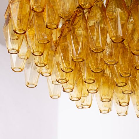 A great classic of italian vintage design and at the same time a magnificent contemporary glass chandelier in murano mid-century. large suspension chandelier ø85 cm made in italy with amber polyhedri in murano glass color, design chandelier. this splendid venetian -style chandelier is a large piece of design that will surely add luxury and class to your space.    type: made in italy chandelier collection: polyiedri glass color: amber dimensions: ø85 x h55 cm (33.4 "l x 21.6" h) + chain about 50 cm (20 ") and rosone decorative elements: 275 polyhedri + spare glass included in the price frame finish: brass materials: steel, brass, blown glass weight: about 90 kg (190 pounds)  chain and rose window: included in the price  extension: the chain is maximum about 50 cm long (20 ") and is adjustab Suspension Chandelier, Murano Glass Chandelier Modern, Italian Chandeliers Murano, Blown Glass Chandelier, Chicken Kitchen, Murano Glass Chandelier Vintage, Vintage Murano Chandelier, Rose Window, Pink Murano Glass Chandelier