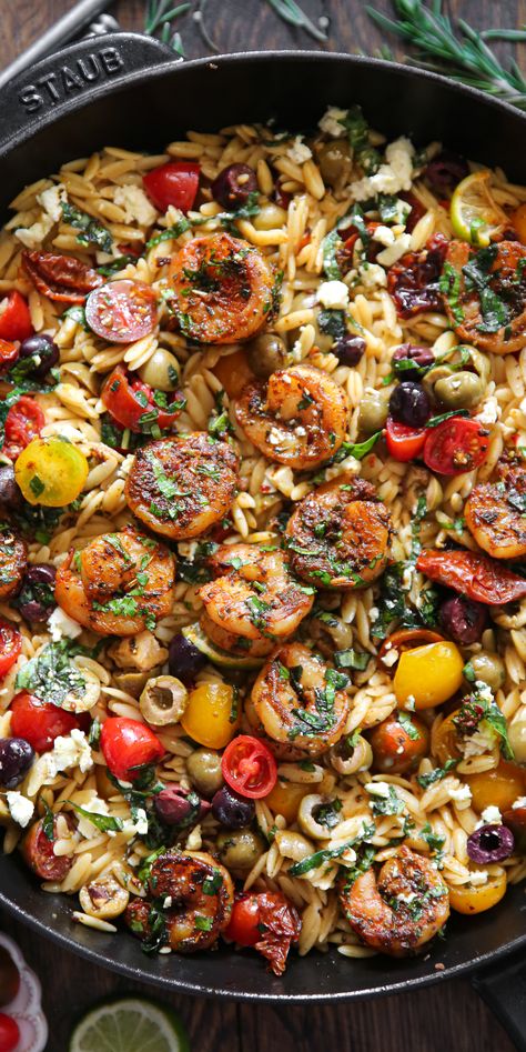 Greek Shrimp Orzo with Feta, Olives, Sun-Dried Tomatoes, and Cherry Tomatoes - in a cast iron skillet. Greek Shrimp Orzo, Julias Album, Shrimp With Orzo, Orzo With Feta, Orzo Feta, Greek Shrimp, Shrimp Orzo, Mediterranean Recipes Healthy, Mediterranean Diet Recipes Dinners