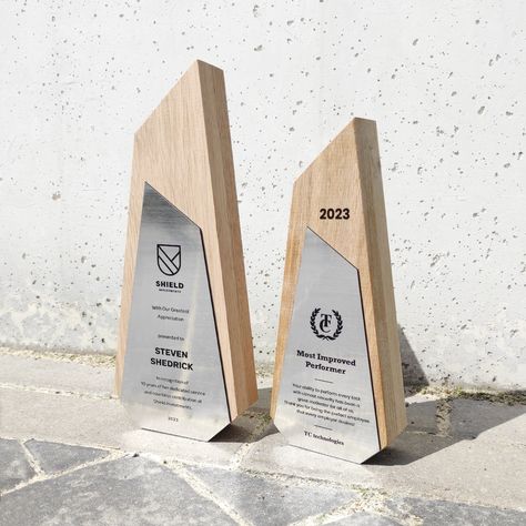 "#High-quality materials #Handmade products #Unique and modern designs #Worldwide shipping #Personalisable awards Bespoke wooden trophy, irregular shaped award for best employee, corporate gift for business partner, appreciation of achievement There are two sizes: Small: 100x240x40 mm / 3.93\" x 9.44\" x 1.57\" Large: 120x288x40 mm / 4.72\" x 11.33\" x 1.57\" Weight of trophies: Small: 0.6 kg. (1.32 lbs) Large: 0.8 kg (1.76 lbs) Materials: solid oak, engraved silver flexibrass This handmade trop Wooden Award Trophy Design, Wooden Trophy Design Ideas, Trophy Ideas Design, Wood Trophy Design, Partner Appreciation, Thunder Laser, Wood Trophy, Handmade Trophies, Wooden Trophy