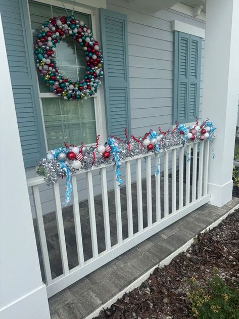 Outdoor Railing Decoration Christmas, Pool Noodle Christmas Door Garland, Pool Noodle Christmas Garland, Christmas Porch Railing Decorating Ideas, How To Wrap Porch Posts, Pool Noodle Christmas, Porch Garland, Christmas Staircase Decor, Pool Noodle Crafts