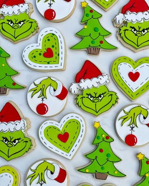 Grinch Cookie Ideas, Grinch Christmas Cookies Decorated, Grinch Face Cookies, Grinch Decorated Cookies, The Grinch Sugar Cookies, Grinch Calendar, Grinch Royal Icing Cookies, Grinch Tree Cookies Decorated, Grinch 1st Birthday Cookies