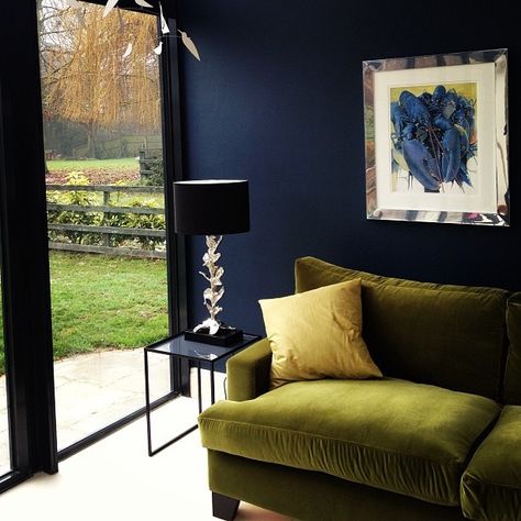 TREND ALERT - OLIVE GREEN Dark Blue Walls, Navy Walls, Green Armchair, Green Couch, Colourful Living Room, Green Sofa, Dark Walls, Living Room Green, Blue Rooms