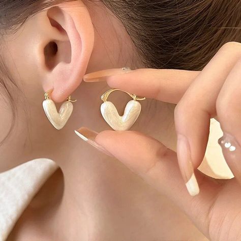 Make a romantic statement with our Elegant Heart-Shaped Earrings! 💖✨ Perfect for expressing love and style. Shop now! Aesthetic Piercing, Korean Fashion Elegant, Romantic Earrings, Earrings Aesthetic, Heart Hoop Earrings, Alloy Earrings, Heart Dangle Earrings, Heart Shaped Earrings, Party Earrings