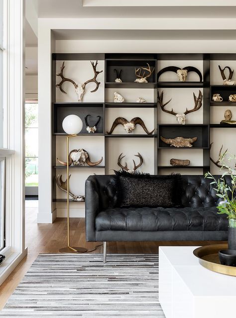 Living Room Decor European, Antler Living Room Decor, Modern Farmhouse Living Room With Deer Mounts, Modern House With Deer Head, Rustic Living Room With Deer Mounts, Home Office With Deer Mounts, Office With Taxidermy, Basement With Deer Mounts, Rustic Black And White Living Room