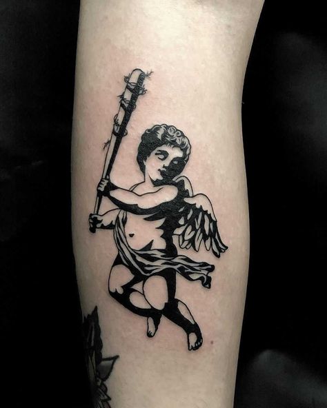 Naughty cherub tattoo by Loz McLean inked in a blackwork style Tattoo Ak47, Cupid Tattoo, Cherub Tattoo, Tattoo Lettering Design, Realistic Tattoo Sleeve, Gangsta Tattoos, Angel Tattoo, Tattoo Flash Art, Black Ink Tattoos