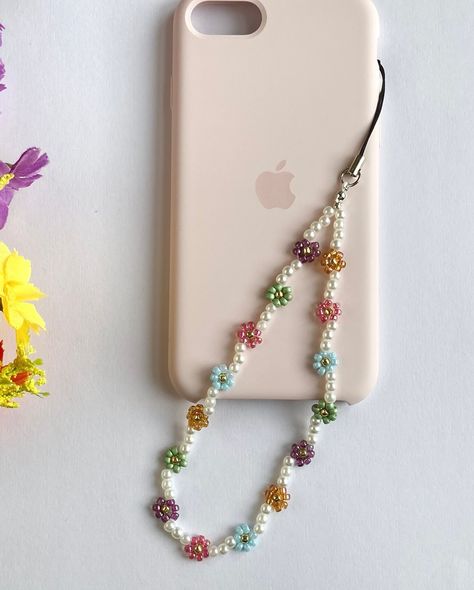 Beaded flower phone straps 🌸🌼🌺 Which colourway is your fave? #phonestraps #phonebeads #beadedflower #phoneaccessories #cottagecoreaesthetic Beaded Flower Keychain, Phone Jewelry Accessories, Diy Phone Strap, Phone Charms Diy, Diy Phone Charms, Phone Charms Strap, Phone Strap Beads, Beaded Phone Charms, Phone Hanger