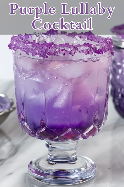 The Purple Lullaby Cocktail is a visually stunning drink that combines Viniq, Hpnotiq, and grape vodka, topped with lemon-lime soda. This cocktail features a beautiful shimmering purple hue and offers a unique blend of flavors, making it a perfect choice for a special occasion or a night out. Purple Drinks Alcohol, Winter Vodka Cocktails, Drink Essentials, Crazy Cocktails, Grape Vodka, Vodka Cocktails Easy, Summer Vodka Cocktails, Purple Cocktails, Purple Drinks