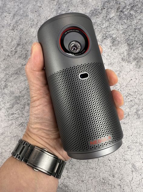 REVIEW – The last video projector I reviewed, the JMGO N1S Ultra left me quite happy. It was bright, high resolution, and even had Google smarts built in. NEBULA, makers of projectors from Anker, has released what they claim as the world’s smallest Google TV equipped projector, the Capsule Air. As Steve Martin once said, […] Small Projector, Graphics Tablets, Google Tv, Steve Martin, Video Projector, Bluetooth Audio, Bluetooth Keyboard, Edc Gear, Latest Gadgets