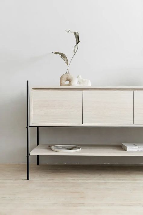 For Sale on 1stDibs - The Credenza Colima follows the concepts of functionalism with its two shelf surfaces and storage area. The electrostatic painted steel structure shows Minimalist Credenza, Credenza Table, Office Credenza, Credenza Decor, White Oak Veneer, White Credenza, Tv Stand Designs, Credenza Design, Furniture Design Chair