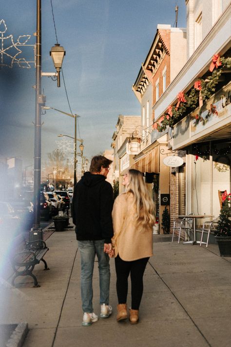 Main Street Photo Shoot, Engagement Photos Town Square, Downtown Couple Photoshoot Winter, Winter City Couple Photoshoot, Main Street Engagement Photos, Engagement Photos Street, Downtown Christmas Photo Shoot, Town Couple Photoshoot, Small Town Couple Photoshoot