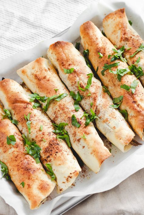 Easy to whip up and so delicious, these Musakhan Rolls are made with shredded chicken, caramelized onions, sumac and other spices. Serve them with a side of yogurt or tahini and it’s the perfect summer meal! The best part - you can make the filling a day or two in advance so you only have to assemble the pita bread and serve. #easydinner #weeknightmeals #middleeastern #shreddedchicken #palestiniancuisine Musakhan Rolls, Middle East Food, Syrian Food, Chicken Pita, Middle East Recipes, Lebanese Cuisine, Summer Meal, Delicacy Food, Eastern Cuisine