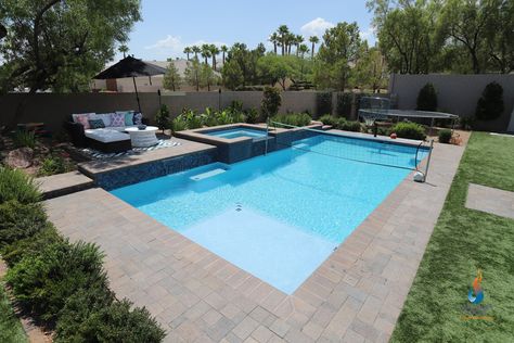 To accommodate the active family's lifestyle,a large sport pool with a raised spa has room to swim laps, play water volleyball or basketball! #sportpool #residentialpool #customswimmingpools #watervolleyball #waterbasketball #lapswimming Pool Budget, Geometric Pools, Sports Pool, Geometric Pool, Rectangle Pool, Beach Entry Pool, Sport Pool, Residential Pool, Pool Remodel