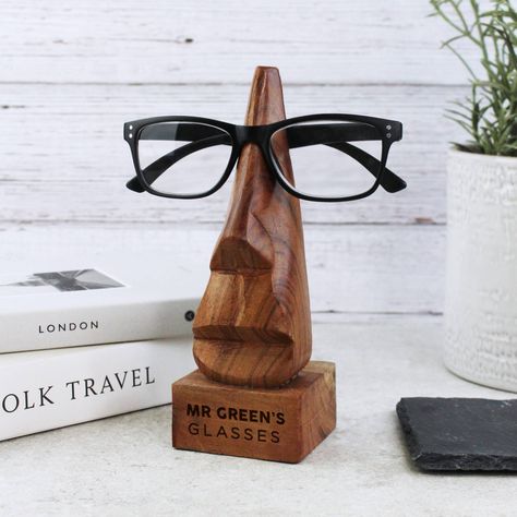 👓🍏 Add a touch of whimsy to your favourite teacher's desk with our charming Personalised Glasses Holder! This unique, nose-shaped wooden stand isn't just a practical place to rest specs; it's a conversation piece that shows your appreciation in the most endearing way. Perfect for end-of-term gifts or just because, every teacher or TA will adore the personalised touch that says, "Thank you for helping us see the world more clearly." 📚🌟 🌈 Crafted with care, given with gratitude. Don’t let this... Eye Glasses Stand, Wooden Glasses Holder, Desk Nightstand, Hen Party Favours, Wooden Glasses, Glasses Stand, Face Reading, Personalised Glasses, Nose Shapes