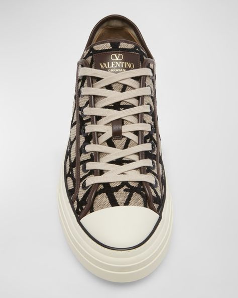 Valentino Garavani "Iconographe" sneakers with allover signature Vlogo jacquard textile upper and leather trim    Flat heel    Round cap toe    Laceup vamp    Logo patch at tongue    Leather lining    Embossed logo heel    Leather outsole     Made in Italy Outfit Grid, Embossed Logo, Leather Trim, Valentino Garavani, Leather Trims, Low Top, Patch Logo, Neiman Marcus, Top Sneakers