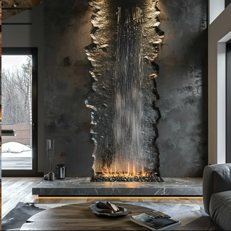 Imagine a fireplace that embodies the serene majesty of a cascading waterfall, bringing the soothing sights and sounds of nature into your living space. Crafted from polished stone in hues of slate and granite, its mantelpiece mimics the rugged edges of cliffs, adorned with moss and tiny ferns that thrive in the mist. Water gently flows down the front in a seamless curtain, catching the firelight as it dances across the smooth surface, creating a mesmerizing play of shadows and reflections. T... Interior Waterfall Design, Living Room Waterfall, Interior Waterfall, Fake Stone Wall, Millwork Wall, Water Curtain, Cascading Waterfall, Sounds Of Nature, Futuristic Home